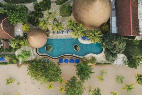 Aerial view of Sudamala Resort Komodo, its pool, its gardens and its beach